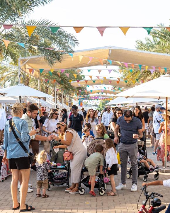 Crowd enjoying an outdoor community and lifestyle experience managed by Ripe Events in the UAE.