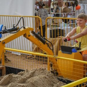 Kid is playing at Diggers Lab at The Ripe Market - Academy Park Dubai.