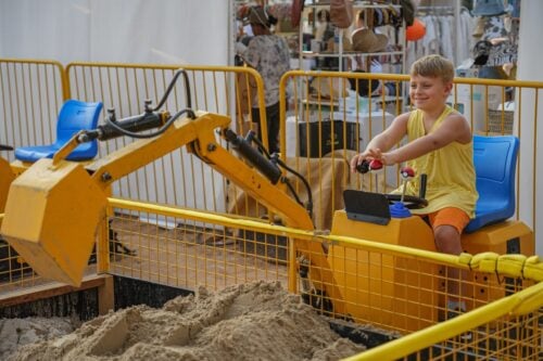 Kid is playing at Diggers Lab at The Ripe Market - Academy Park Dubai.