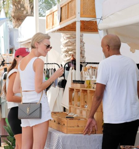 Shoppers browsing handmade goods at The Ripe Market – Academy Park Dubai artisan vendor stall.