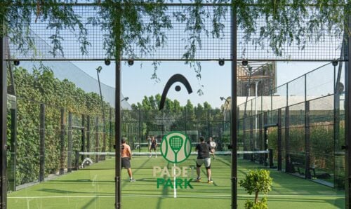 Adults playing padel at the Ripe Market - Academy Park in Dubai.