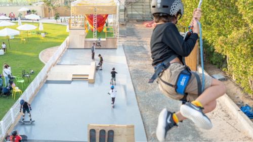 Kids zipline and skatepark activities at the Ripe Market Academy Park